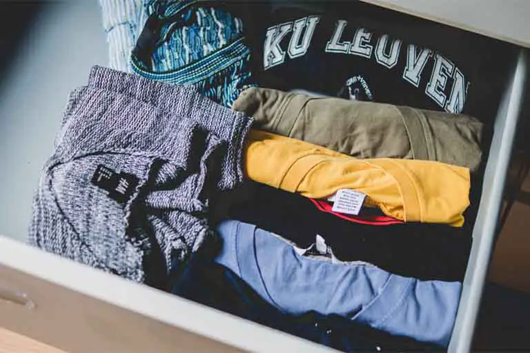 image of neatly folded clothes inside a drawer