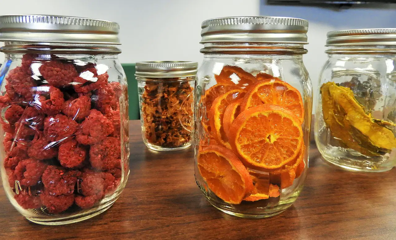 jars with different preserved fruits