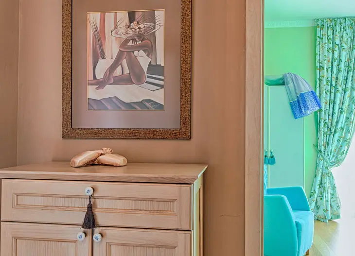 brown wooden cabinet near doorway